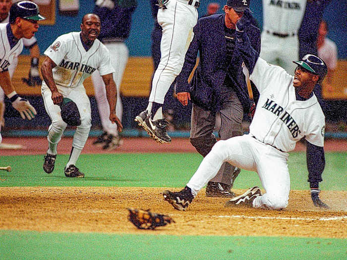 Ken Griffey Jr. slides into home