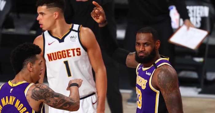Los Angeles Lakers forward LeBron James (23) reacts against the Denver Nuggets during the fourth quarter in game five of the Western Conference Finals of the 2020 NBA Playoffs at AdventHealth Arena.