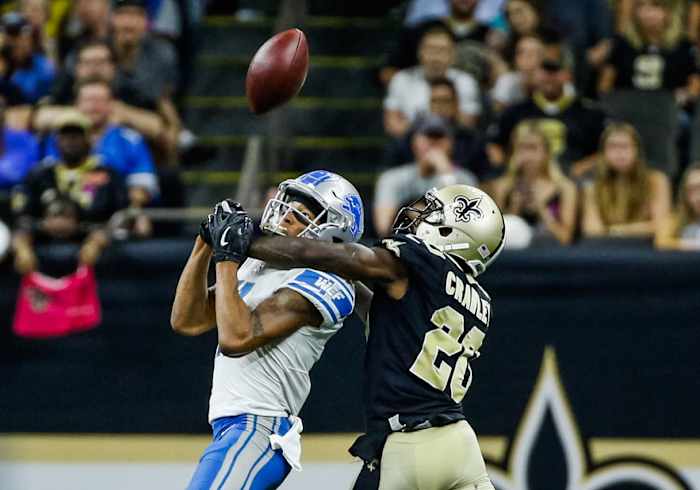 Saints CB Ken Crawely breaks-up pass play