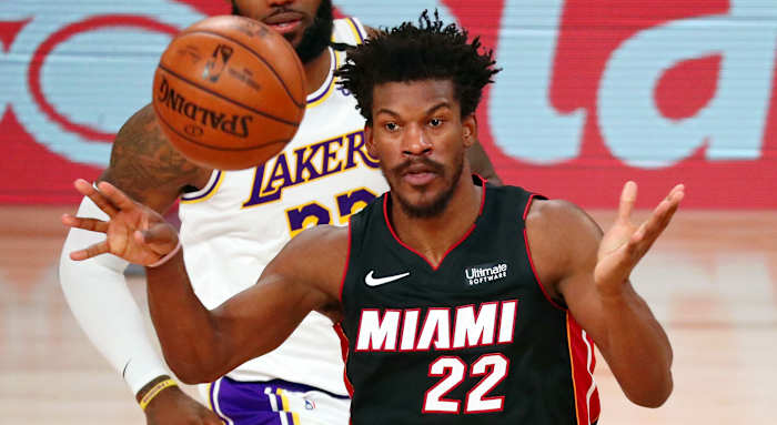 Miami Heat forward Jimmy Butler (22) passes the ball against the Los Angeles Lakers during the third quarter of game three of the 2020 NBA Finals at AdventHealth Arena.