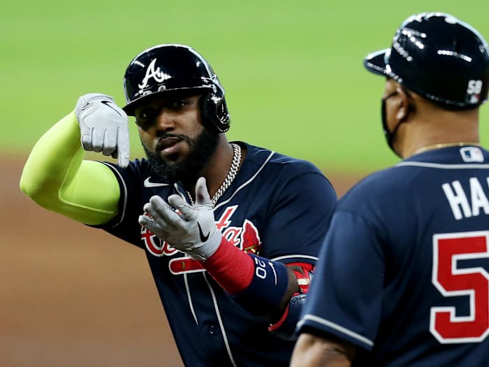Oct 8, 2020; Houston, Texas, USA; Atlanta Braves designated hitter Marcell Ozuna (20) reacts after hitting a single against the Miami Marlins during the sixth inning of game three of the 2020 NLDS at Minute Maid Park.