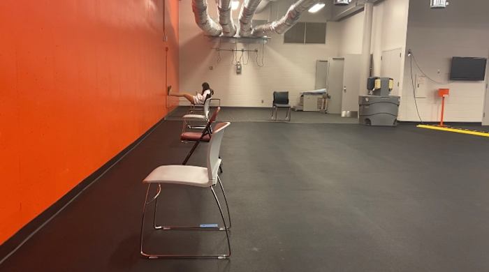 Waiting area for test results. Chairs are spaced 6 feet apart, facing the wall.