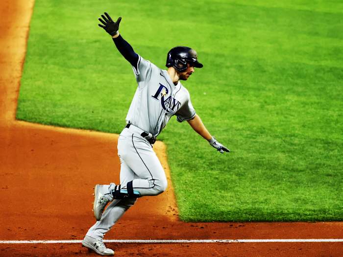 Oct 21, 2020; Arlington, Texas, USA; Tampa Bay Rays second baseman Brandon Lowe (8) rounds the bases after hitting a two-run homerun in the 5th inning against the Los Angeles Dodgers in game two of the 2020 World Series at Globe Life Field.