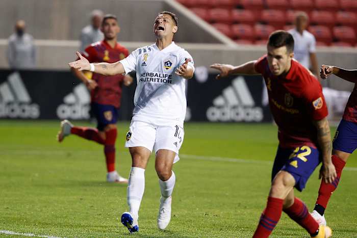 Chicharito reacts to a missed shot