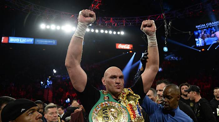 Tyson Fury celebrates his win over Deontay Wilder