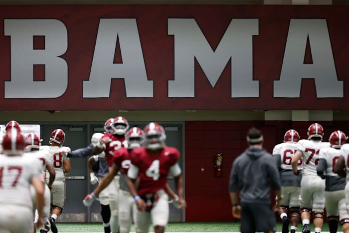 Alabama indoor practice with Bama sign in background, Nov. 11, 2020