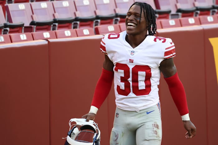Nov 8, 2020; Landover, Maryland, USA; New York Giants cornerback Darnay Holmes (30) smiles while leaving the field after the Giants' game against the Washington Football Team at FedExField.