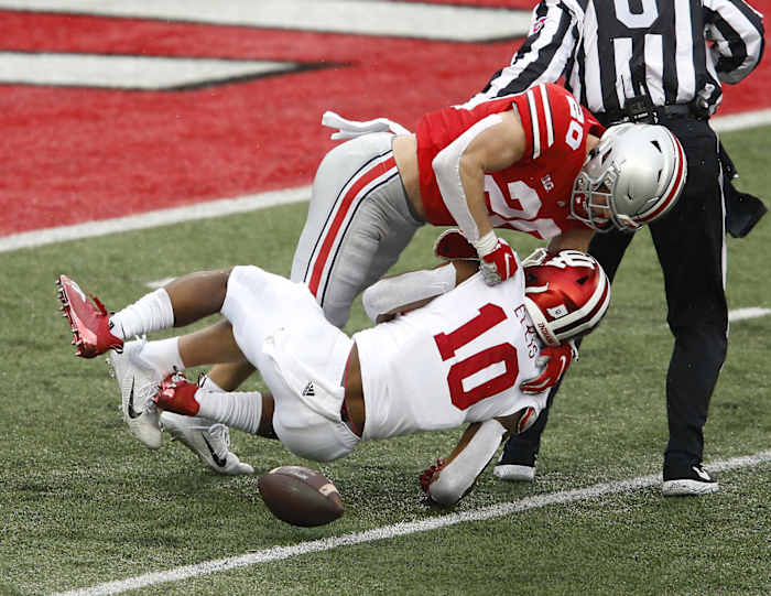 Indiana running back David Ellis (10) fumbles while after being stripped by Ohio State linebacker Pete Werner (20) during the second quarter at Ohio Stadium. (Joseph Maiorana/USA TODAY Sports)