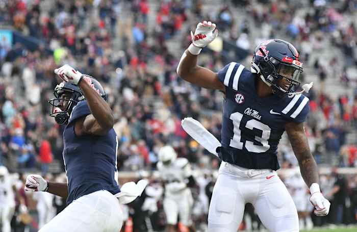 Mississippi wide receiver Braylon Sanders (13) and Mississippi wide receiver Jonathan Mingo (1) celebrate a touchdown against Mississippi State Bulldogs at Vaunt-Hemingway Stadium in Oxford, Miss. on Saturday, Nov. 28, 2020. (Bruce Newman)