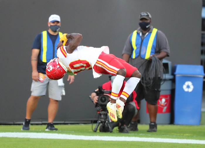 Nov 29, 2020; Tampa, Florida, USA; Kansas City Chiefs wide receiver Tyreek Hill (10) celebrates his touchdown scored with a back flip against the Tampa Bay Buccaneers during the first half at Raymond James Stadium. Mandatory Credit: Kim Klement-USA TODAY Sports