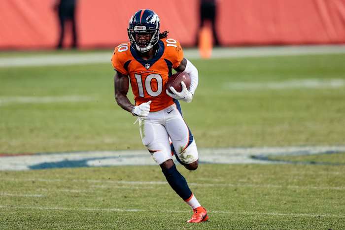 Denver Broncos wide receiver Jerry Jeudy (10) runs the ball on a reception in the fourth quarter against the Denver Broncos at Empower Field at Mile High.