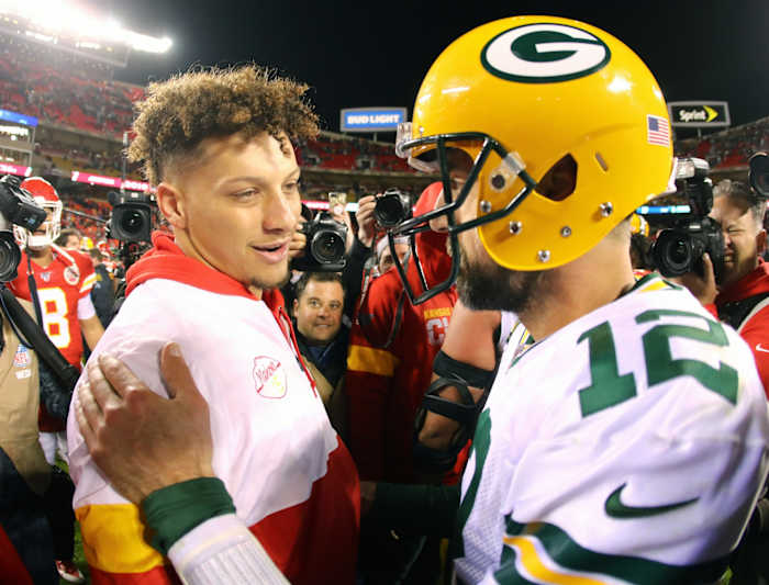 Oct 27, 2019; Kansas City, MO, USA; Green Bay Packers quarterback Aaron Rodgers (12) talks with Kansas City Chiefs quarterback Patrick Mahomes (15) after the game at Arrowhead Stadium. Mandatory Credit: Jay Biggerstaff-USA TODAY Sports