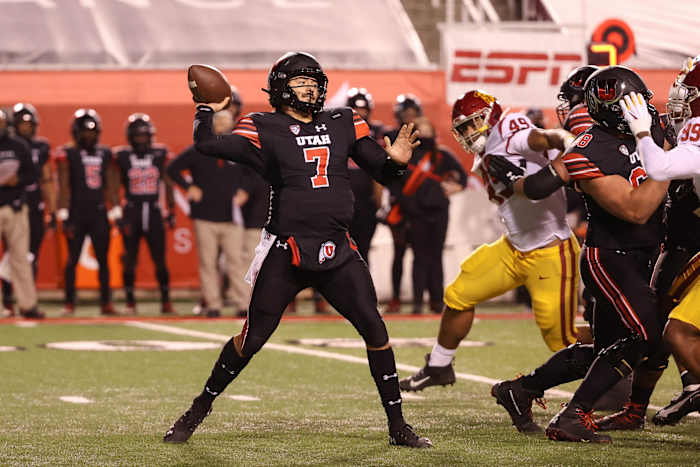 Nov 21, 2020; Salt Lake City, Utah, USA; Utah Utes quarterback Cameron Rising (7) throws the ball down the field against the USC Trojans during the first quarter at Rice-Eccles Stadium.