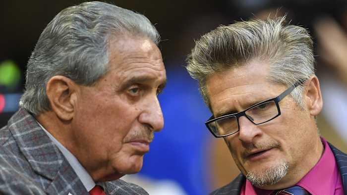 Falcons owner Arthur Blank (left) and Dimitroff talk on the sidelines during a game against the Los Angeles Rams.