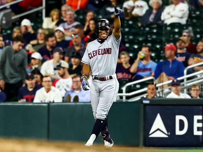 Sep 6, 2019; Minneapolis, MN, USA; Cleveland Indians shortstop Francisco Lindor (12) celebrates after hitting an RBI single against the Minnesota Twins in the eleventh inning at Target Field.