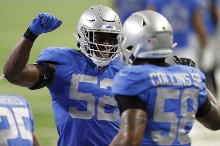 Christian Jones celebrates with Jamie Collins during the second quarter against the Houston Texans.