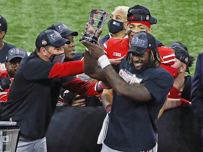Trey Sermon lifts the Big Ten championship trophy