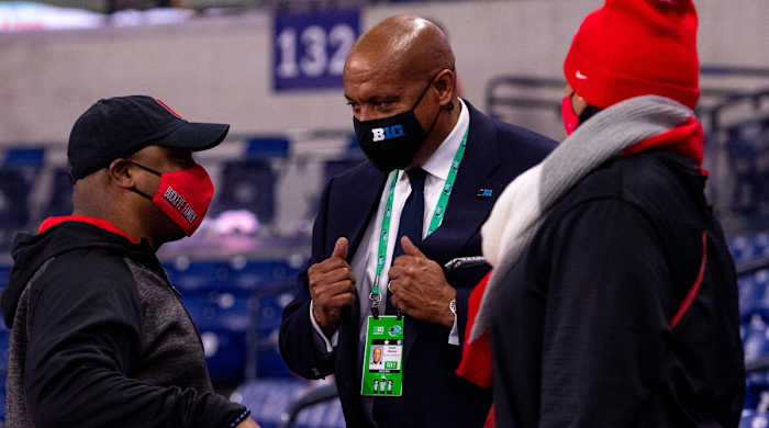 Big Ten Conference commissioner Kevin Warren visits with fans in the stands before the start of the Big Ten Championship game between Ohio State and Northwestern at Lucas Oil Stadium.