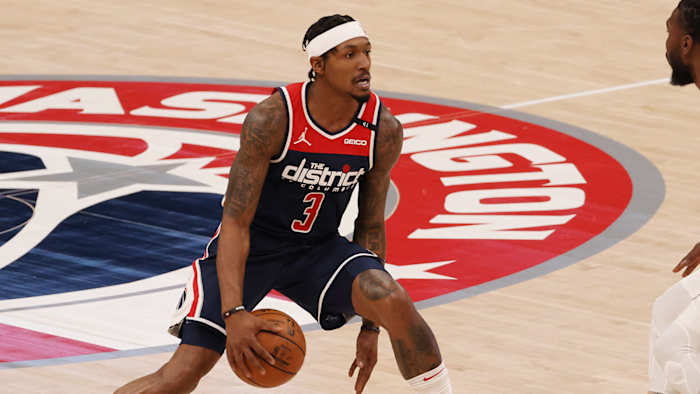 Washington Wizards guard Bradley Beal dribbles the ball as Phoenix Suns forward Jae Crowder defends