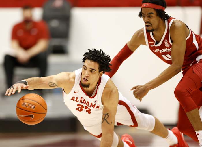 January 16, 2021, Alabama basketball forward James Rojas dives for a loose ball against Arkansas in Tuscaloosa, AL.