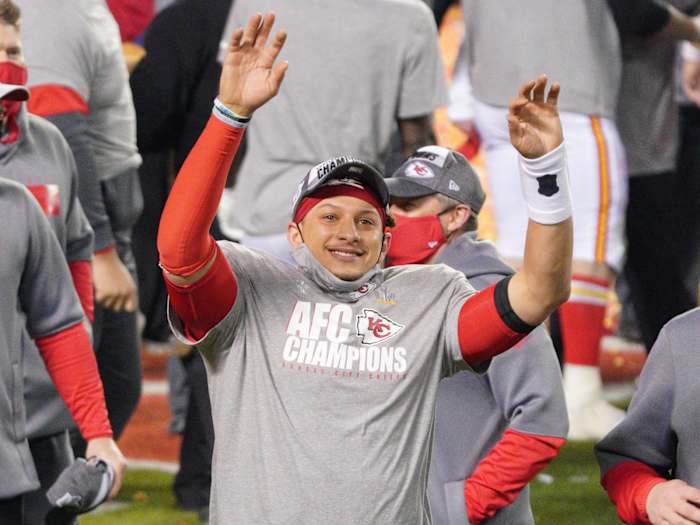 Kansas City Chiefs quarterback Patrick Mahomes waves to the crowd after defeating the Buffalo Bills in the AFC Championship Game at Arrowhead Stadium.