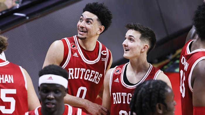 Rutgers players Geo Baker and Aiden Terry celebrate after beating Michigan State, 67-37.