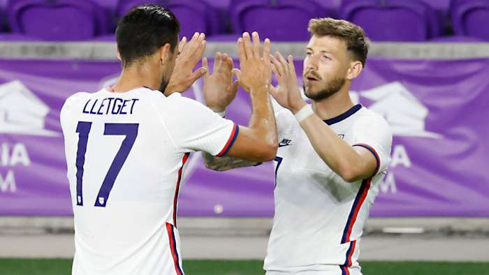 Sebastian Lletget and Paul Arriola celebrate a USMNT goal