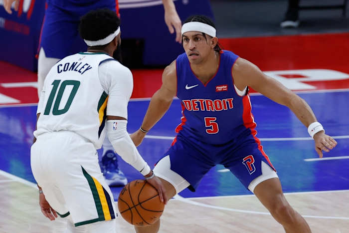 Mike Conley (10) being guarded by former Lone Peak High School star Frank Jackson (5)