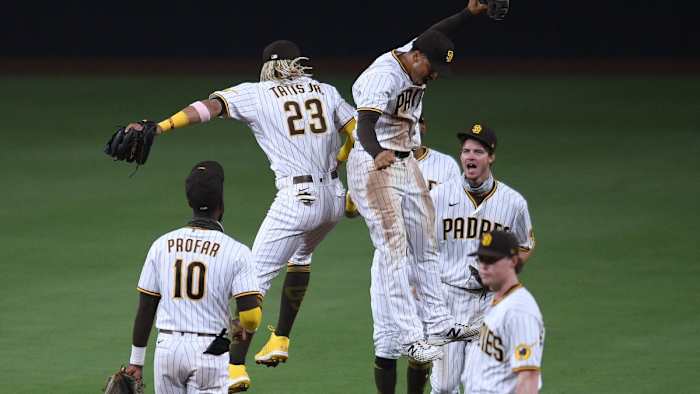Padres players celebrate after beating the Diamondbacks at Petco Park.