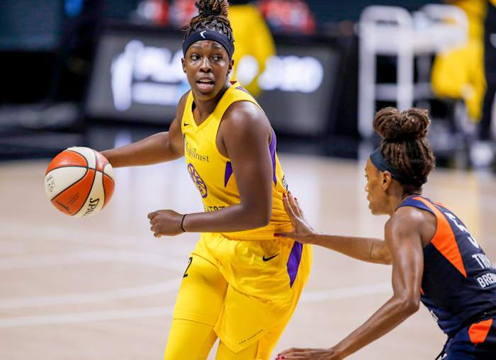 Chelsea Gray dribbling the ball