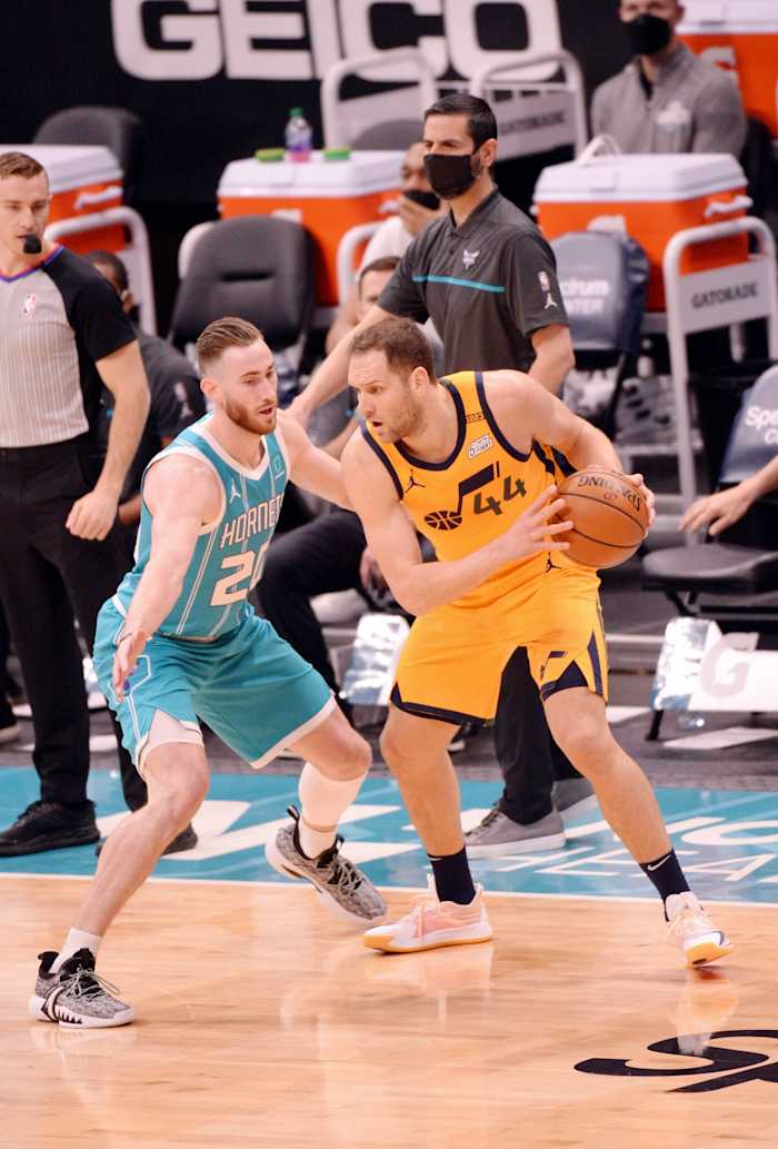 Bojan Bogdanovic (44) is guarded by Gordon Hayward (20) 