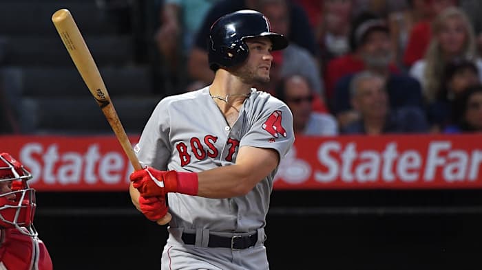 Red Sox outfielder Andrew Benintendi bats against the Angels on Aug. 31, 2019.