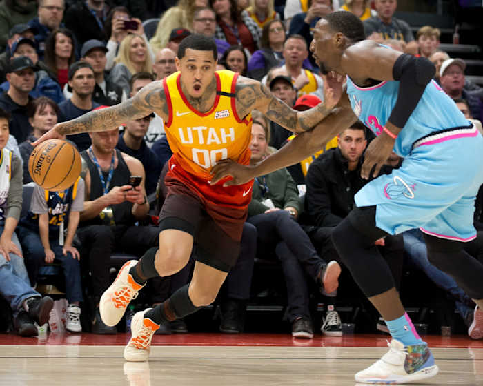 Jordan Clarkson (00) takes on Bam Adebayo (13)