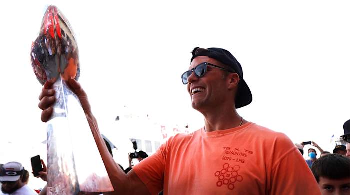 Feb 10, 2021; Tampa Bay, FL, USA; Tampa Bay Buccaneers quarterback Tom Brady holds the Vince Lombardi Trophy during a boat parade to celebrate victory in Super Bowl LV against the Kansas City Chiefs.