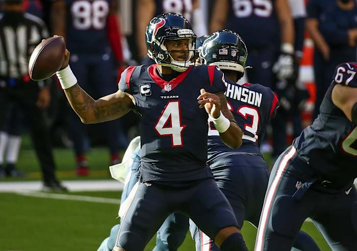 Jan 3, 2021; Houston, Texas, USA; Houston Texans quarterback Deshaun Watson (4) throws a pass against the Tennessee Titans during the first quarter at NRG Stadium. Mandatory Credit: Troy Taormina-USA TODAY Sports