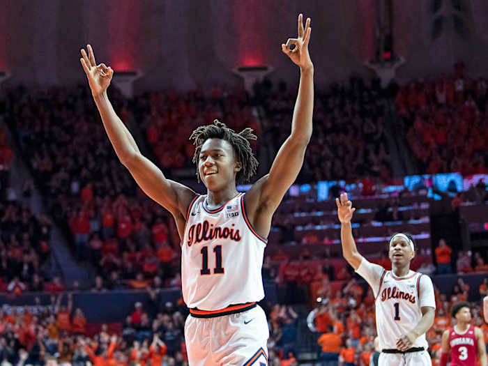 Ayo Dosunmu raises his arms in celebration as a sophomore