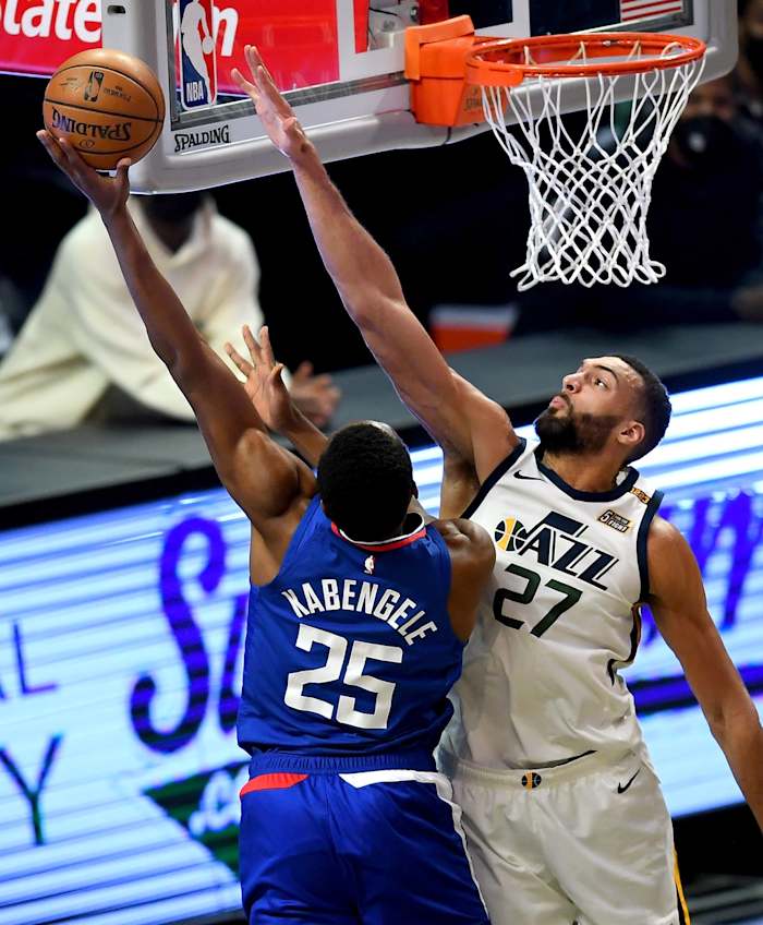 Rudy Gobert goes for a block against Mfiondu Kabengele (25)