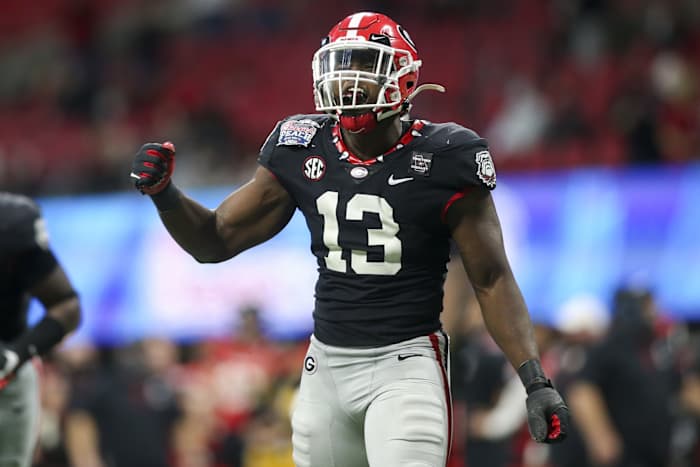 Ojulari celebrates after a sack against the Cincinnati Bearcats in the Chick-fil-A Peach Bowl.