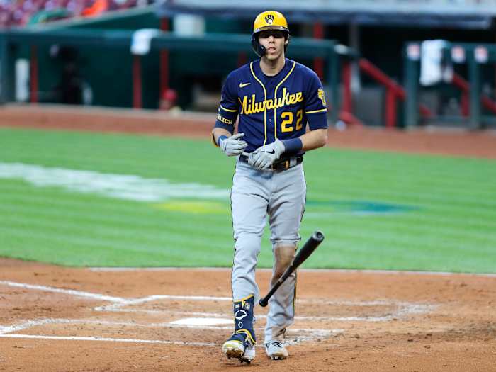 Christian Yelich tosses bat