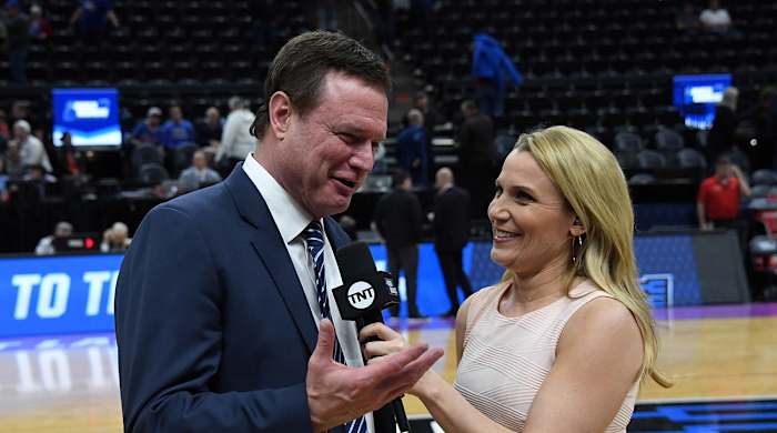 Lisa Byington talks to coach Bill Self