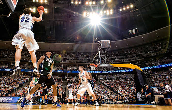 Jimmer Fredette shoots in a 2011 NCAA tournament game