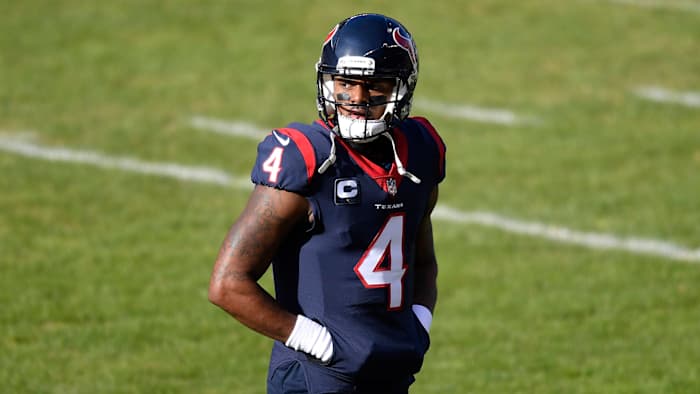 Deshaun Watson walks off the field during a game against the Bears