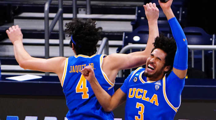 UCLA Bruins guard Jaime Jaquez Jr. (4) and UCLA Bruins guard Johnny Juzang (3) celebrate the win over Alabama Crimson Tide