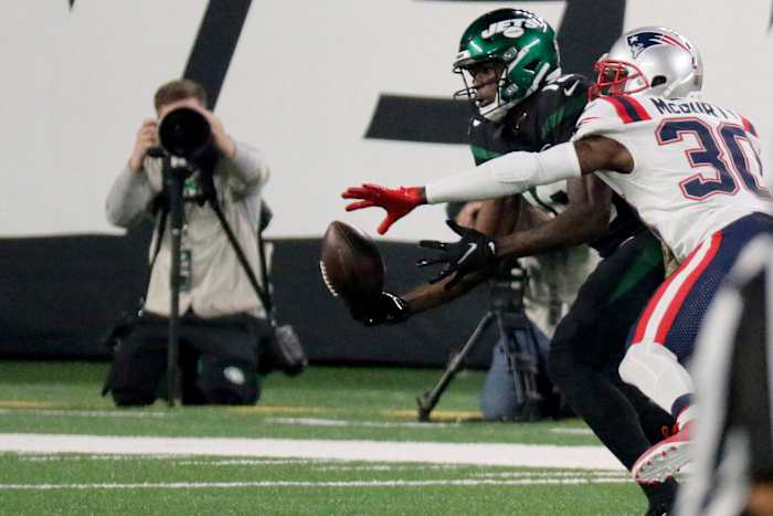 Nov 9, 2020; Jets receiver Breshad Perriman (19) tries to make a catch as Patriots cornerback Jason McCourty (30) defends. Mandatory Credit: Kevin R. Wexler/NorthJersey.com via USA TODAY