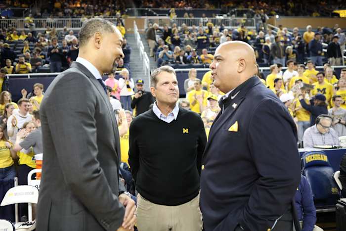 Juwan howard jim harbaugh warde manuel