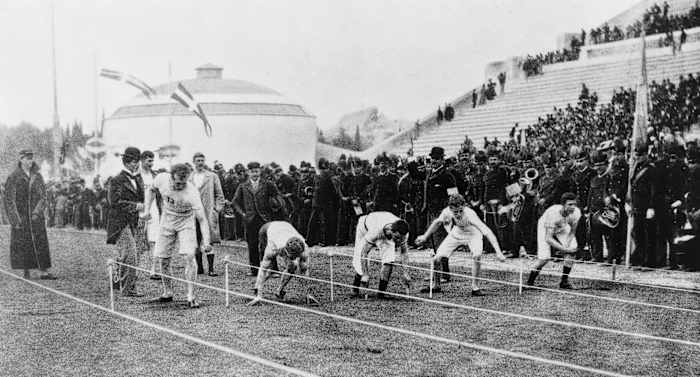 An early event in Greece: the 100 meters, won by a Bostonian, Thomas Burke.