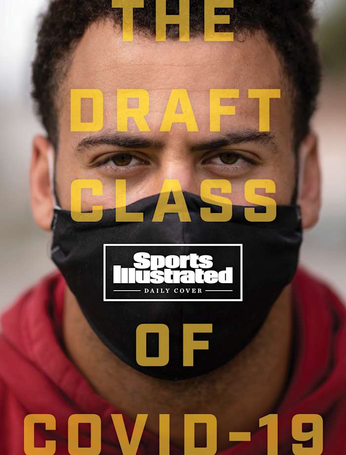 Pittman Jr., photographed at distance, in his mother-made mask.