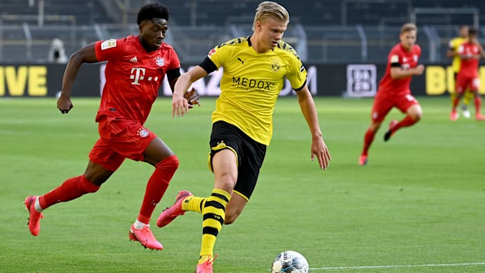 Bayern Munich's Alphonso Davies tracks Dortmund's Erling Haaland