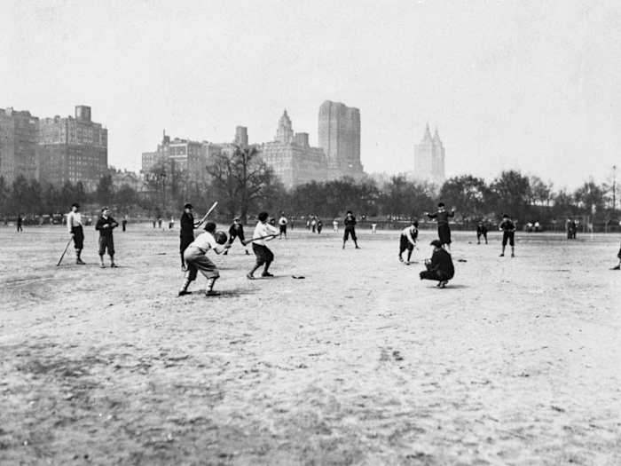Boys from the St. Thomas school, just across 59th Street, reap the rewards of Olmsted and Vaux's civic gift in 1934.