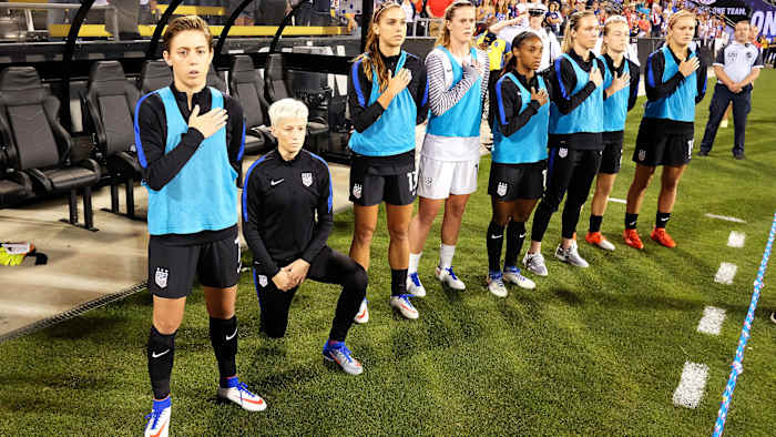 Megan Rapinoe kneels for the anthem at a 2016 U.S. women's national team game